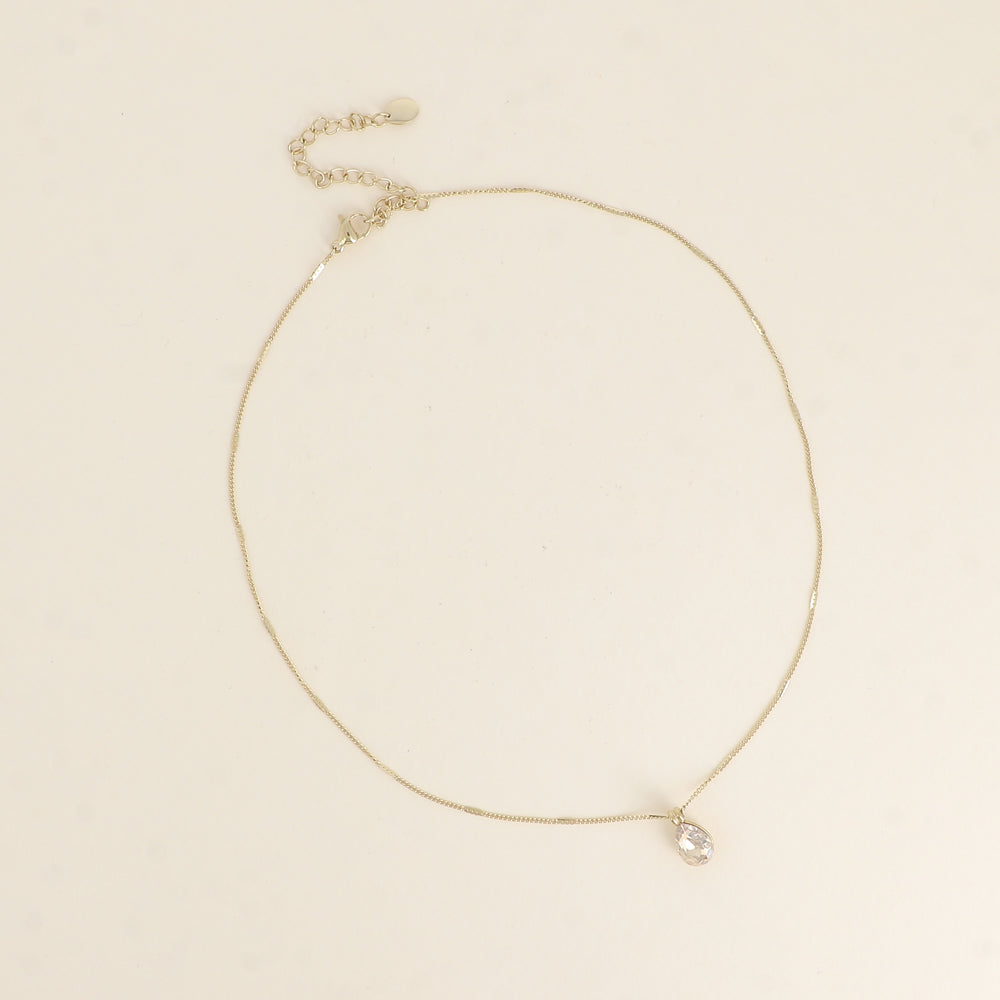Collier orné de cristaux de Swarovski® en forme de goutte - Longueur de chaîne : 38+7 cm - Dimensions du cristal : 7x10 mm - Golden shadow