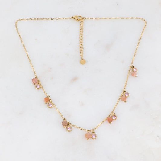 Collier doré embelli de pierres et de strass roses 38+5 cm