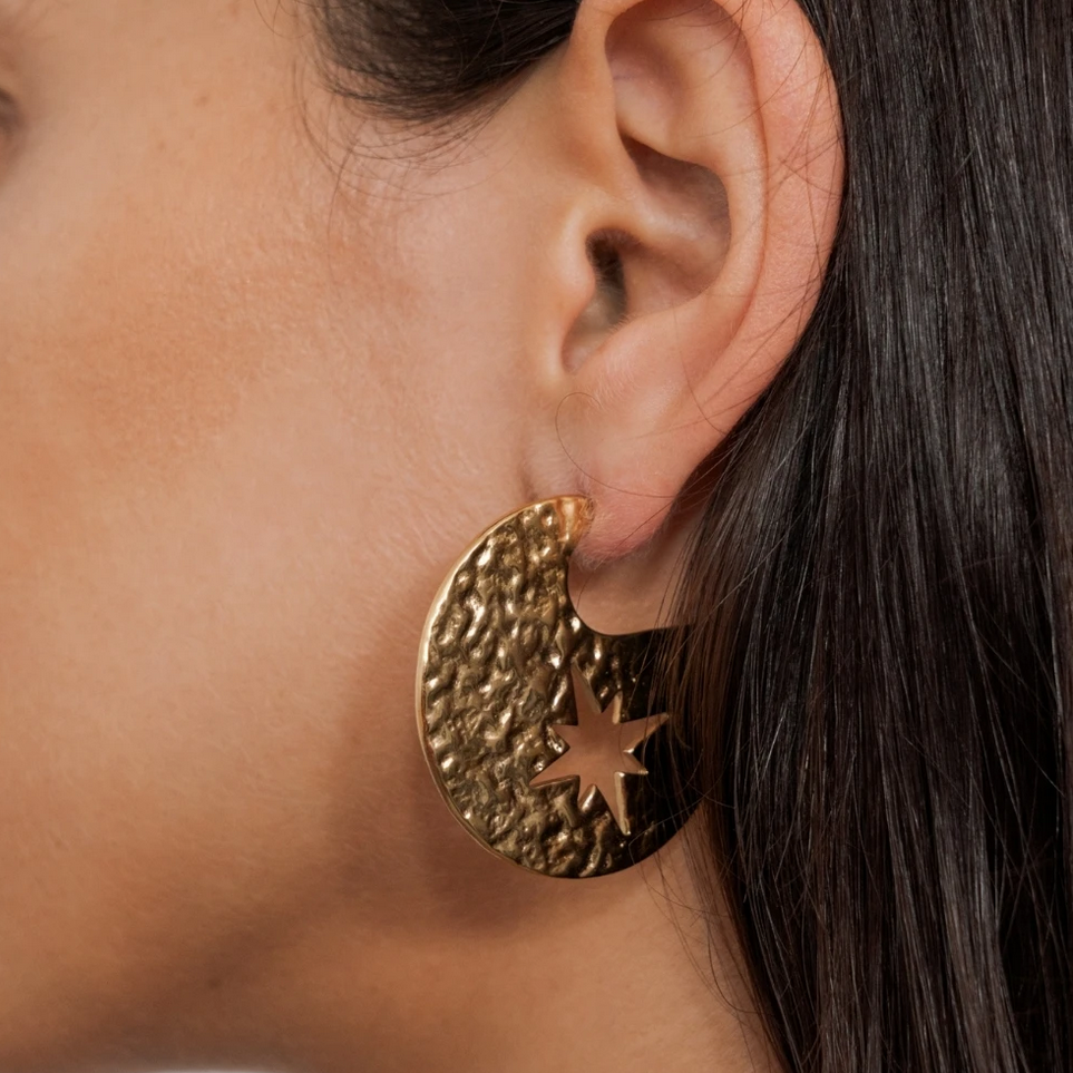 Boucles d'oreilles effet martelé avec étoile du Nord