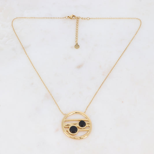 Collier doré avec un pendentif rond ajouré et serti de deux pierres en onyx 38+5 cm