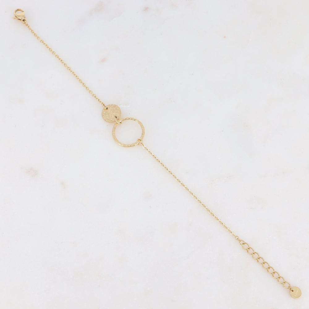 Bracelet avec pièce ronde et anneau, effet martelé