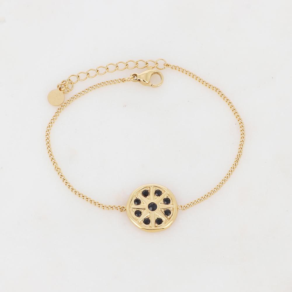 Bracelet avec un pendant rond ornée de strass