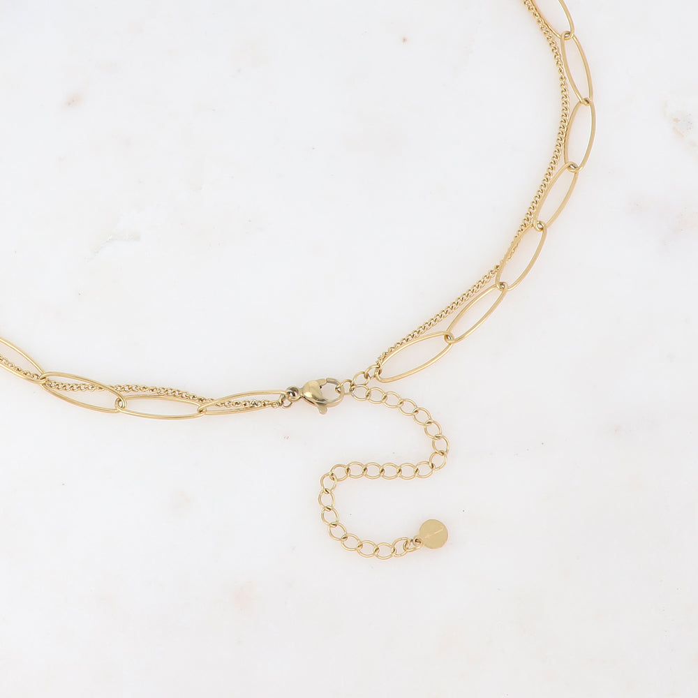 Collier 2 rangs composé d'un pendentif étoile émaillé blanc serti d'un strass blanc 38/50+7 cm