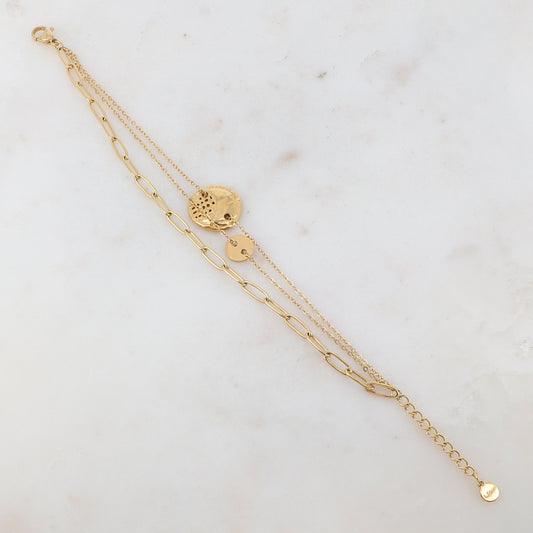 Bracelet trois rangs avec 2 pièces rondes ajourées : lisse et ondulée