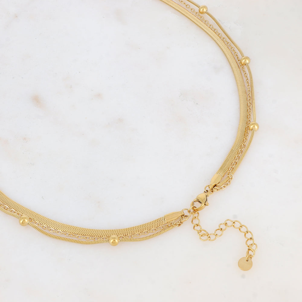 Collier triple rangs doré avec une pampille ronde ornée d'une nacre naturelle grise 38/50/60+5 cm