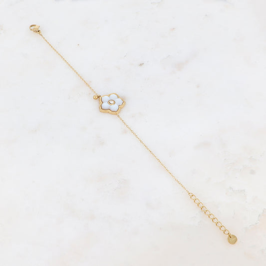 Bracelet avec une fleur nacrée et strassé