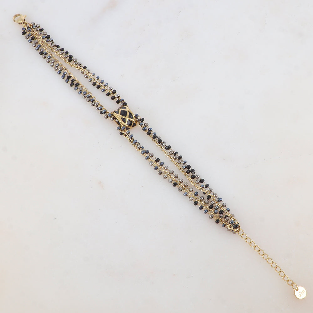 Bracelet trois rangs avec pâtes de verre et pièce émaillée style graphique
