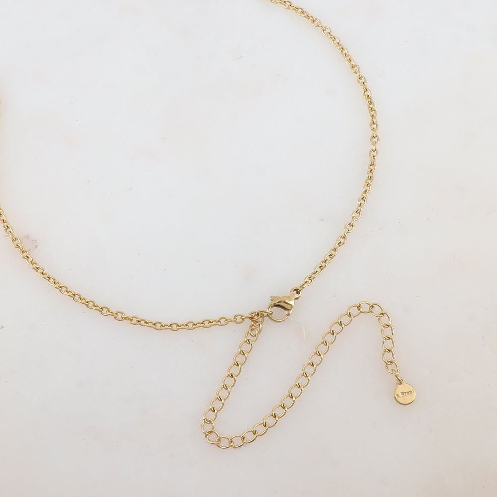 Sautoir avec pendentif anneau serti de strass blancs et de pâtes de verre (80+10CM)