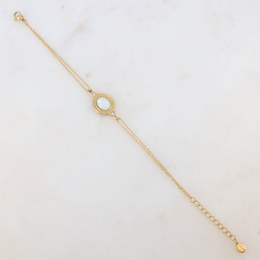 Bracelet deux rangs avec pièce ovale sertie de deux strass et d'une nacre blanche