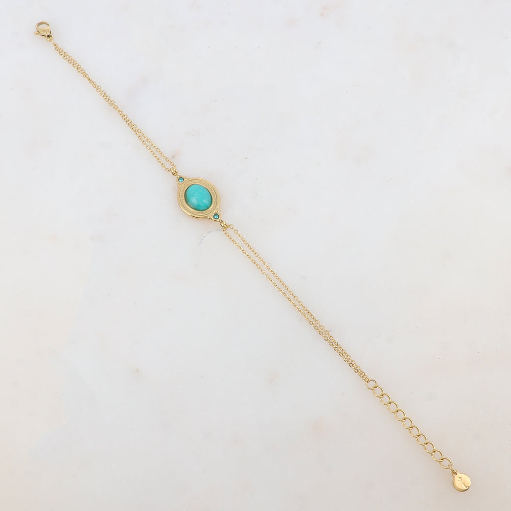 Bracelet deux rangs avec pièce ovale sertie de deux strass et d'une pierre naturelle