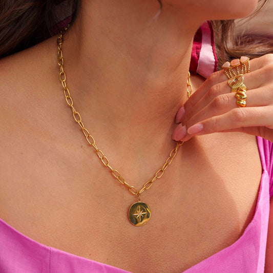Collier en maille texturés avec pampille étoilée et strass