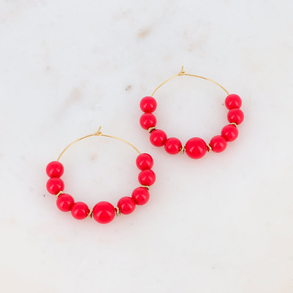 Créoles avec 9 perles en résine Diamètre : 4,5 cm.