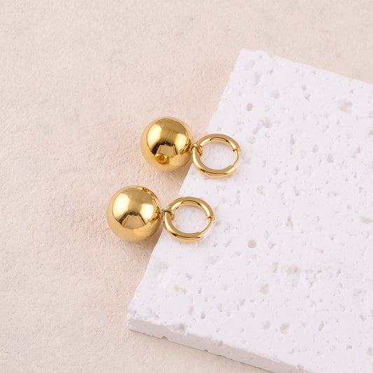 Créoles avec boule lisse, effet miroir 1,6 x 3 cm.