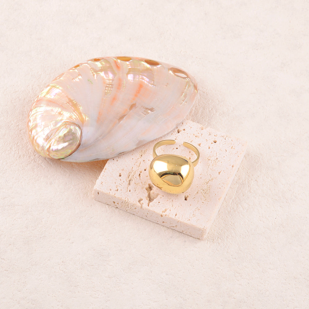 Bague avec pièce géométrique bombée effet miroir