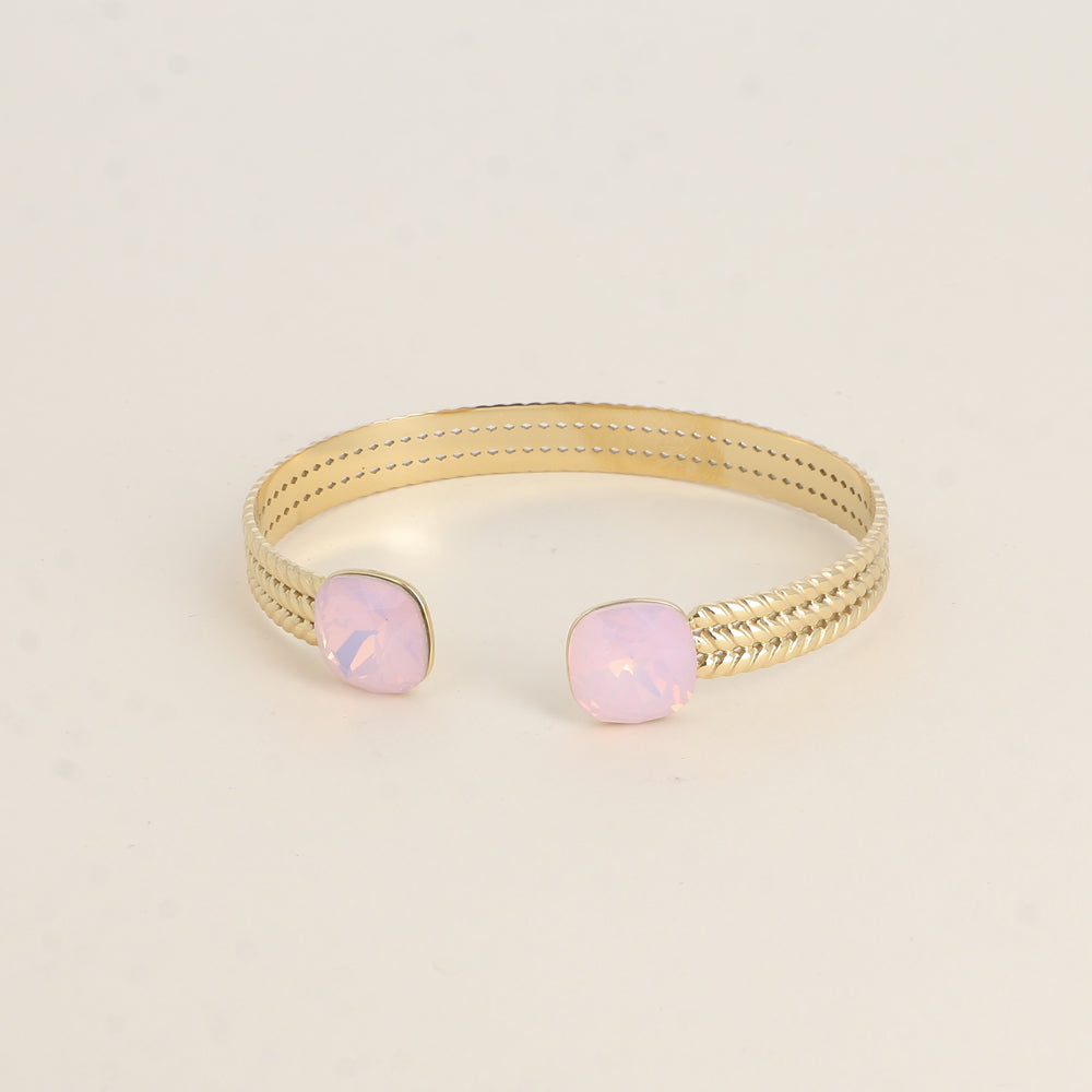 Jonc orné de cristaux de Swarovski® - Rose water opale Dimensions du jonc : 6 x 5 cm - Hauteur du jonc: 8 mm - Dimensions des cristaux : 12 x 12 mm