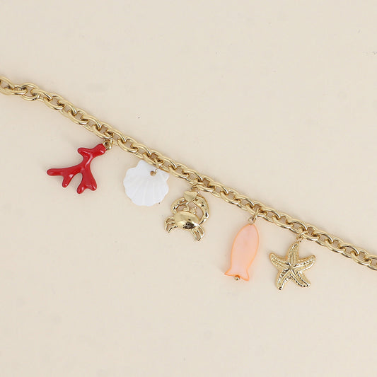 Bracelet - étoile de mer, crabe, branche de corail émaillée, coquillage effet nacré et poisson 17+3 cm