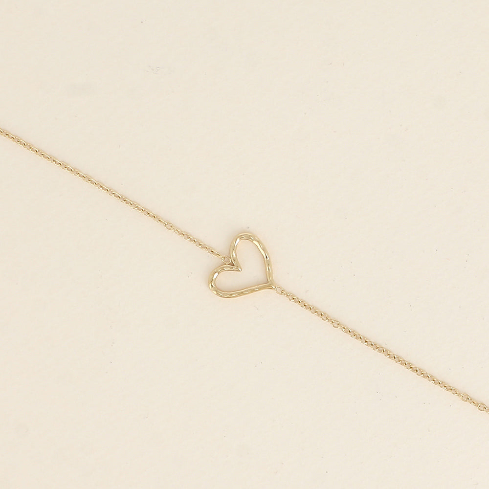 Bracelet - pendentif cœur ajouré (16+3 cm)