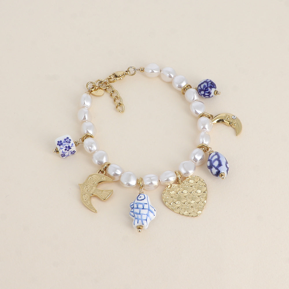 Bracelet sur fil - cœurs, soleil, oiseau, lune, perles en céramique émaillée (18+3 cm)