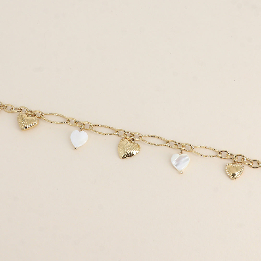 Bracelet - breloques cœurs en nacre blanche (17+3 cm)