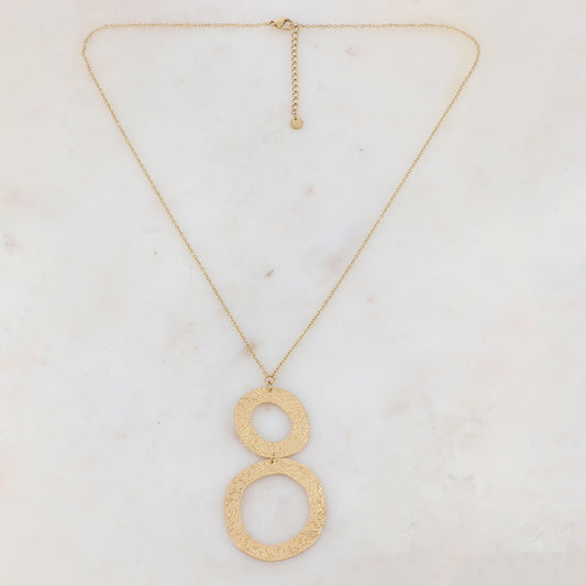 Collier doré avec pendentif rond ajouré avec un motif étoile et embelli de strass 50+5 cm