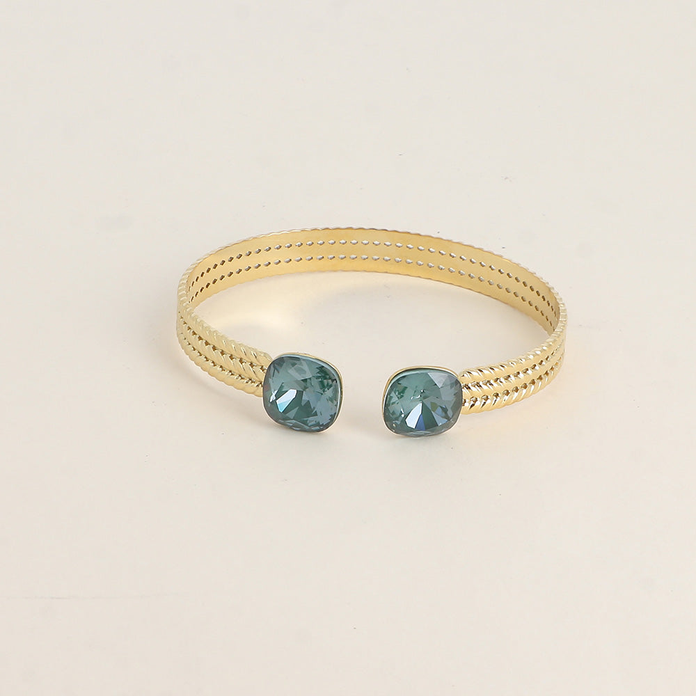 Jonc orné de cristaux de Swarovski® - Pine green ignite - Dimensions du jonc : 6 x 5 cm - Hauteur du jonc: 8 mm - Dimensions des cristaux : 12 x 12 mm