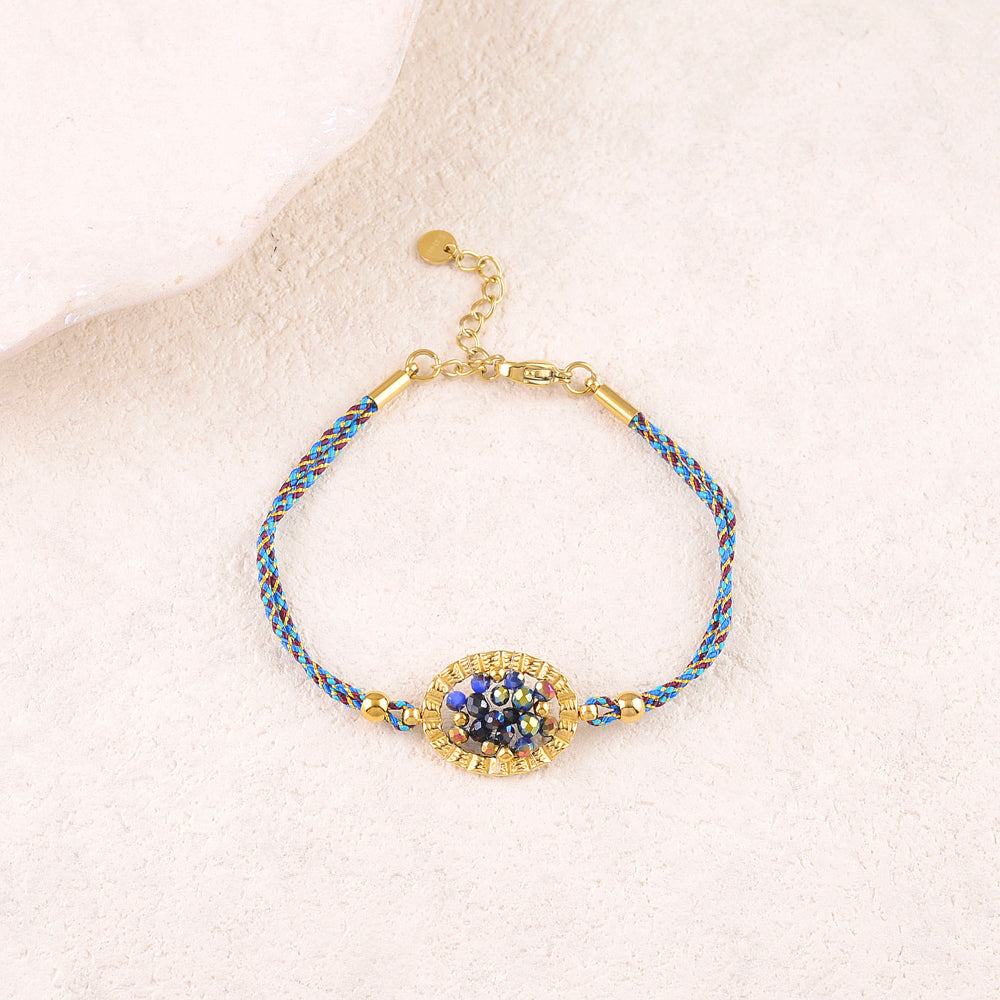 Bracelet double rangs sur cordon avec anneau ovale texturé et perles en pâtes de verre