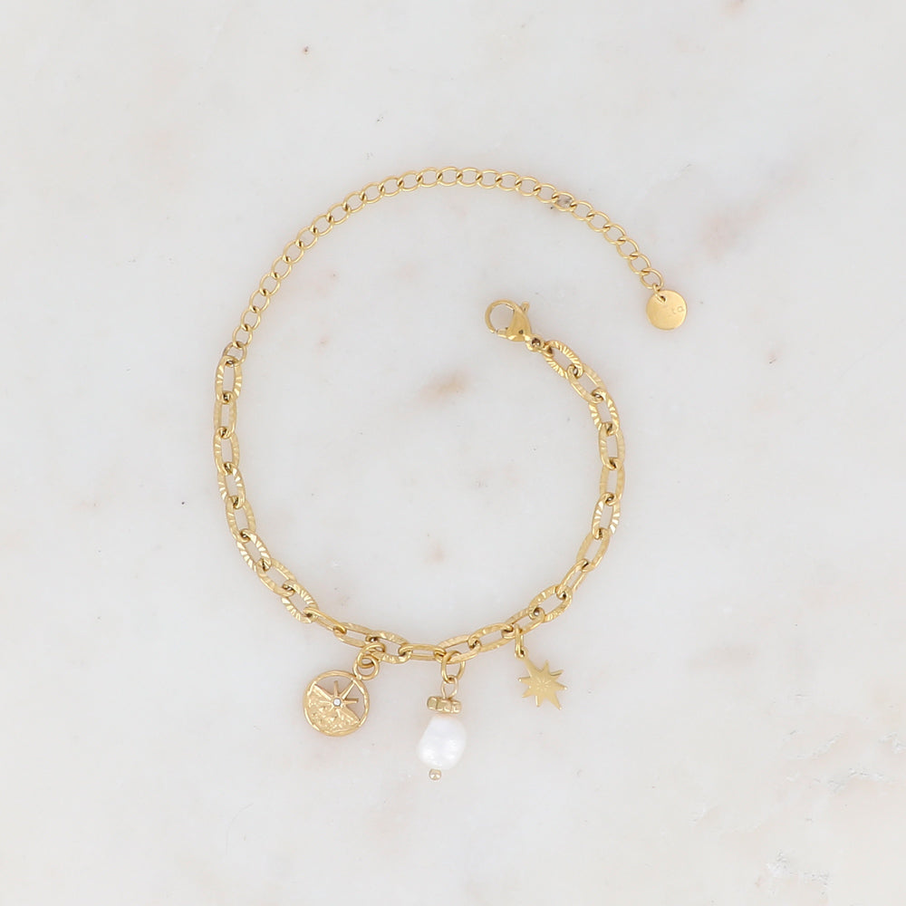 Bracelet en maille avec pampille ronde ajourée motif étoile strassé, étoile du Nord et perle d'eau douce