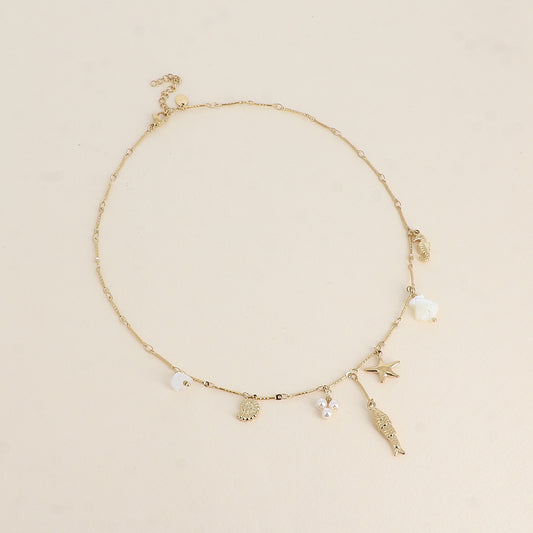 Collier - breloques du thème marin (perles de résine, étoile de mer, poisson, coquillages et hippocampe) 40+5 cm