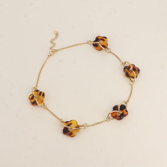 Collier - 5 fleurs de résine - Léopard 40+5 cm