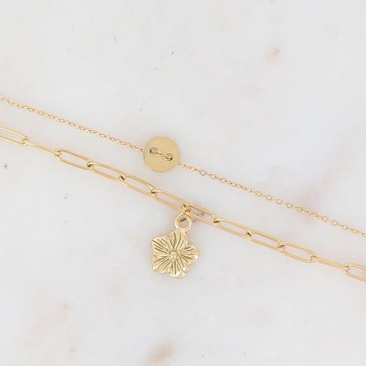 Bracelet double rangs en maille avec pièce ronde et pendentif fleur