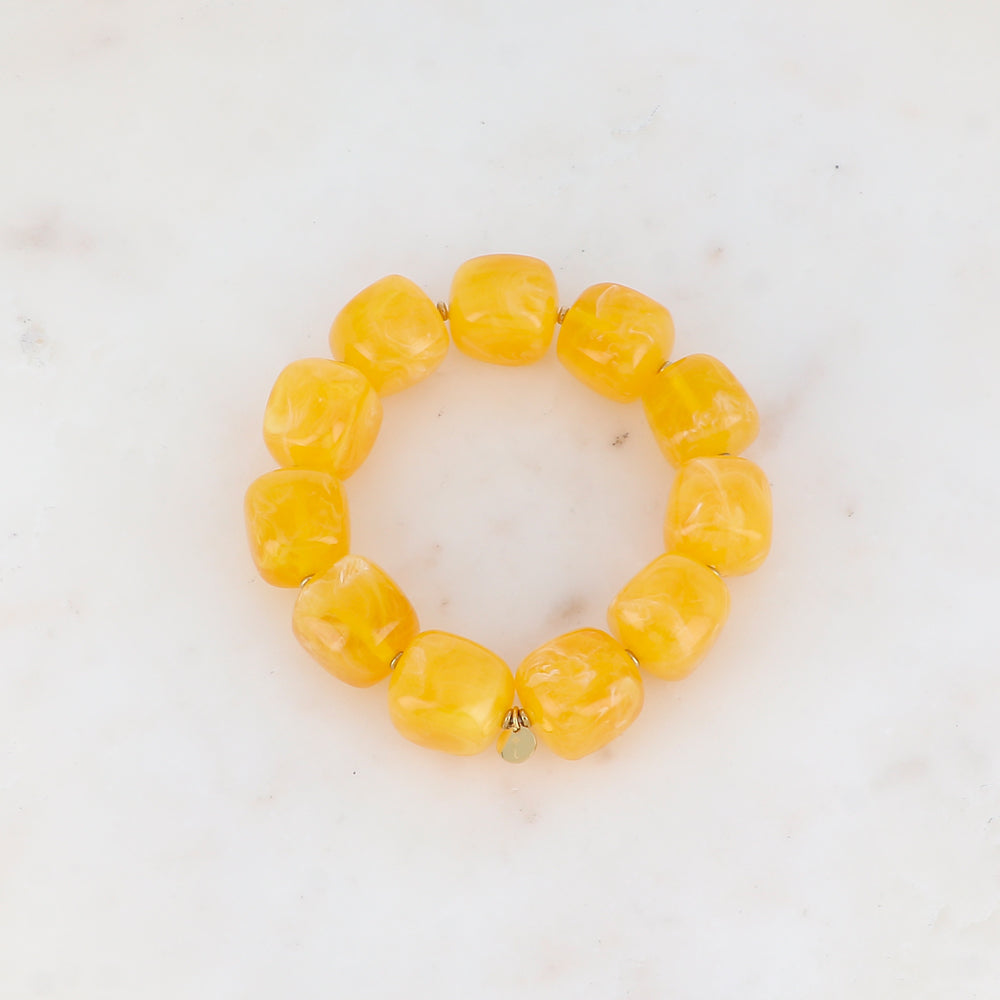 Bracelet élastique avec perles en résine colorée