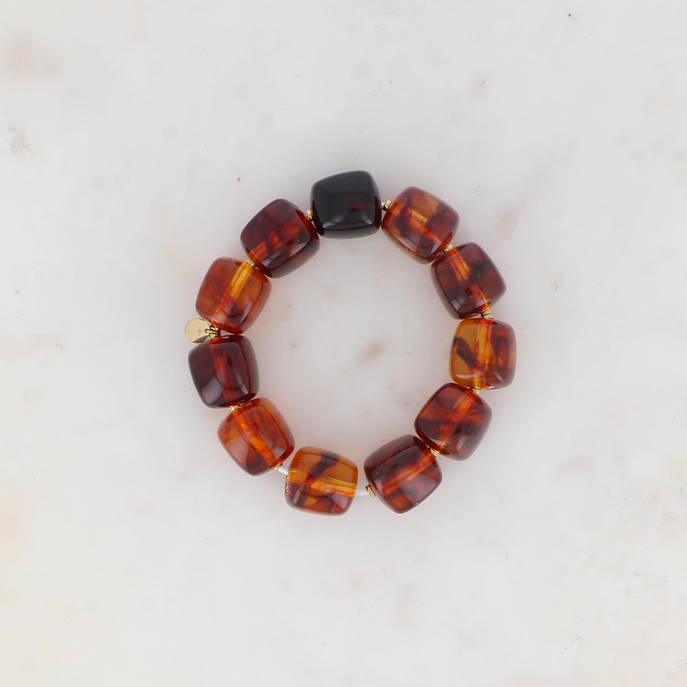 Bracelet élastique avec perles en résine colorée