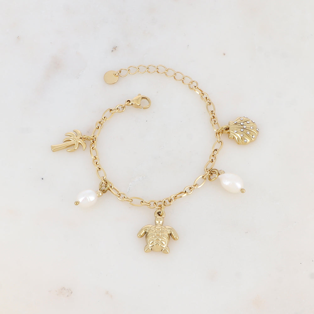 Bracelet en maille avec palmier, tortue, coquillage strassé et perles d'eau douce
