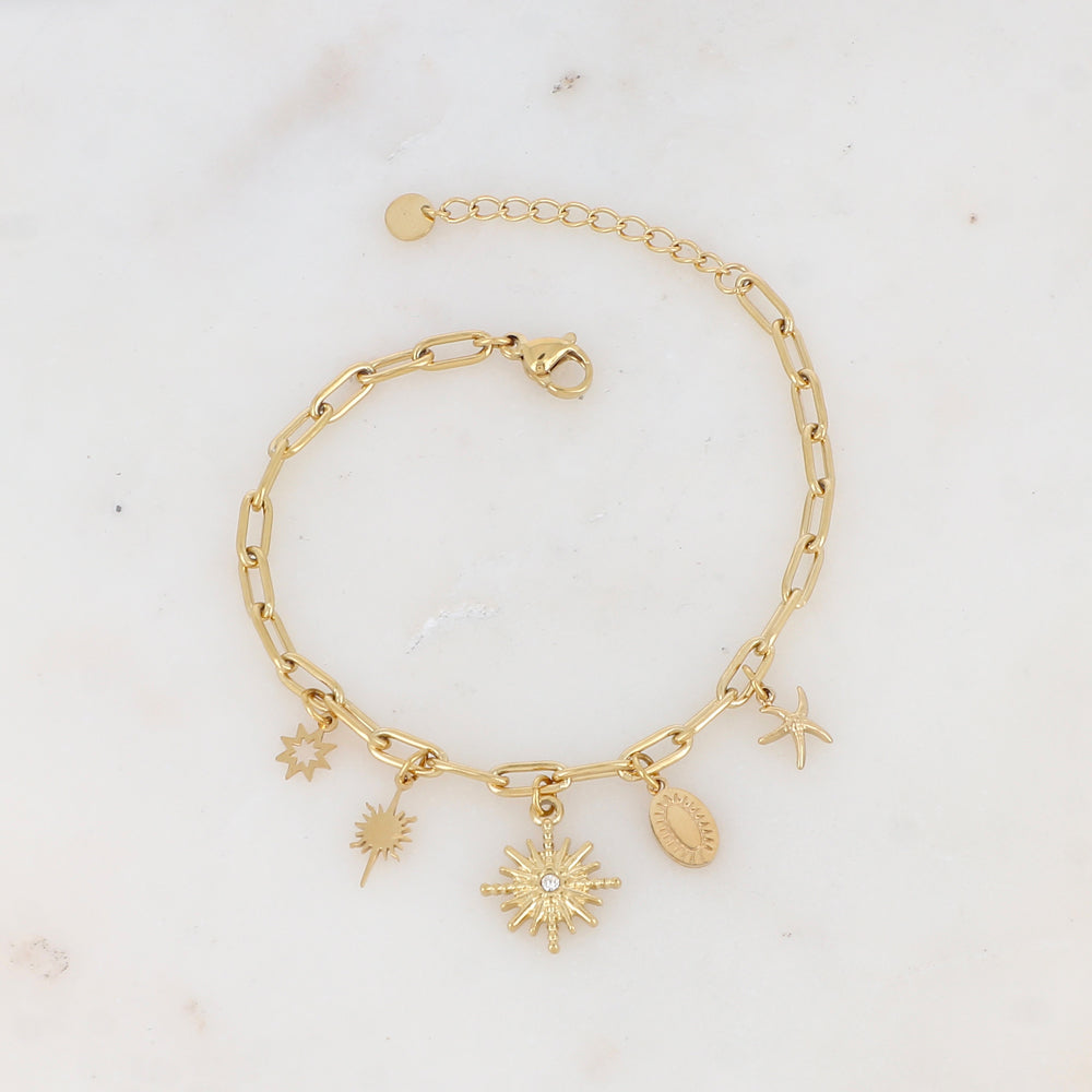 Bracelet en maille avec soleils, strass, étoile de mer et pampille ovale graphique