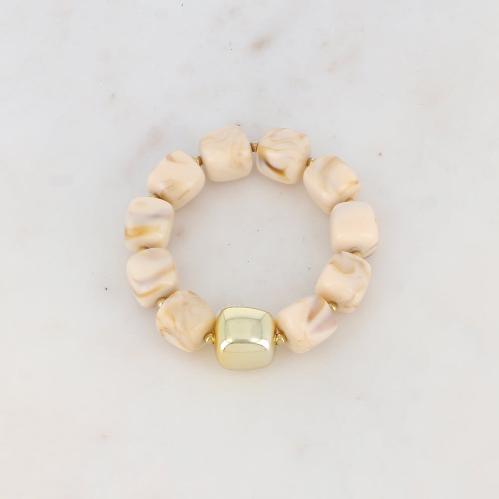Bracelet élastique avec perles en résine colorée et perle métallique