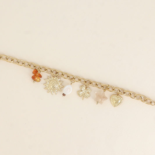 Bracelet - pendentifs (soleil, perle d'eau douce, trèfle, étoile en résine, cœur) 17+3 cm