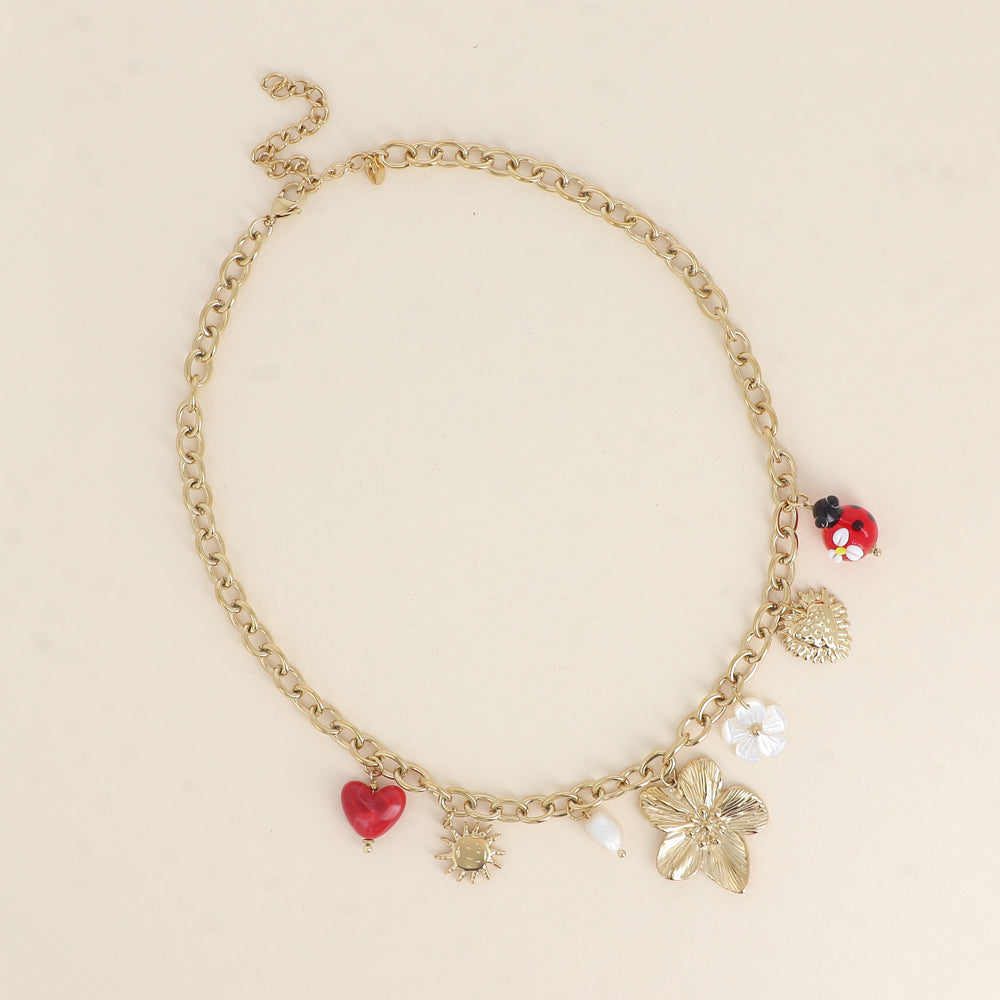Collier - pendentifs (fleur, coccinelle en résine, fleur nacrée, cœur, soleil) 40+7 cm