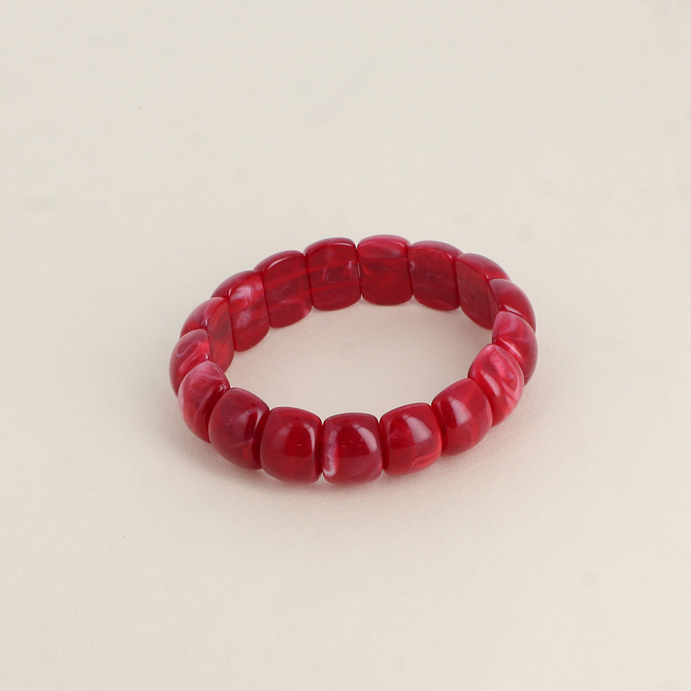 Bracelet élastique - perles en résine Dimensions intérieures du bracelet : 5,5 x 5,5 cm - Epaisseur : 15 mm