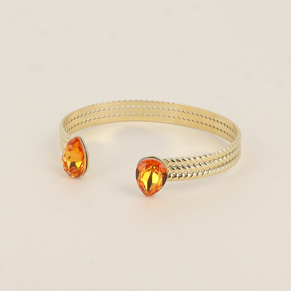 Jonc - anneau tressé orné de 2 cristaux de Swarovski® en forme de goutte - Dark orange - Dimensions intérieures : 58 x 48 mm Epaisseur du jonc : 8 mm