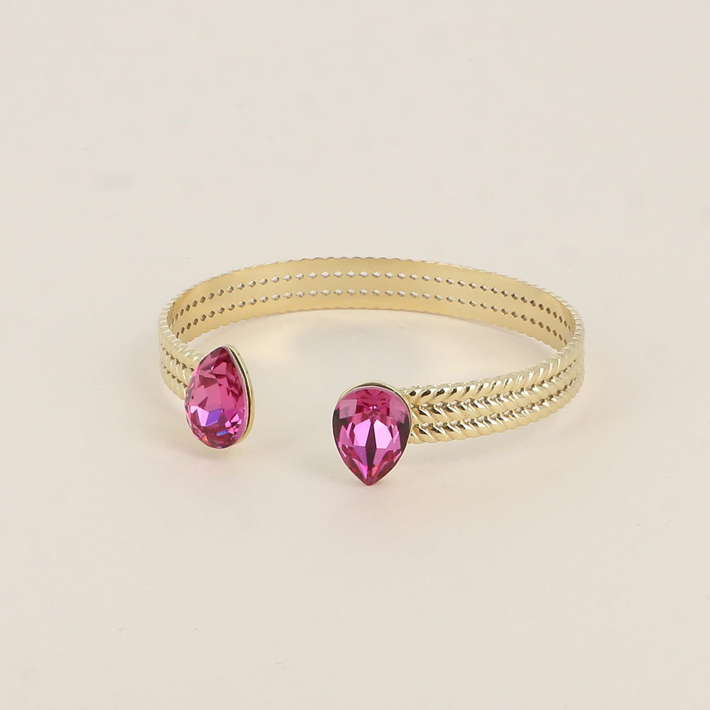 Jonc - anneau tressé orné de 2 cristaux de Swarovski® en forme de goutte - Dark rose - Dimensions intérieures : 58 x 48 mm Epaisseur du jonc : 8 mm