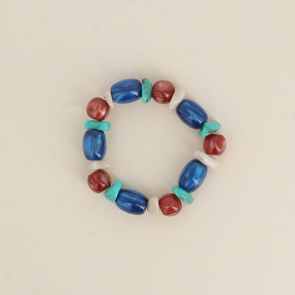 Bracelet élastique - perles en résine bleue