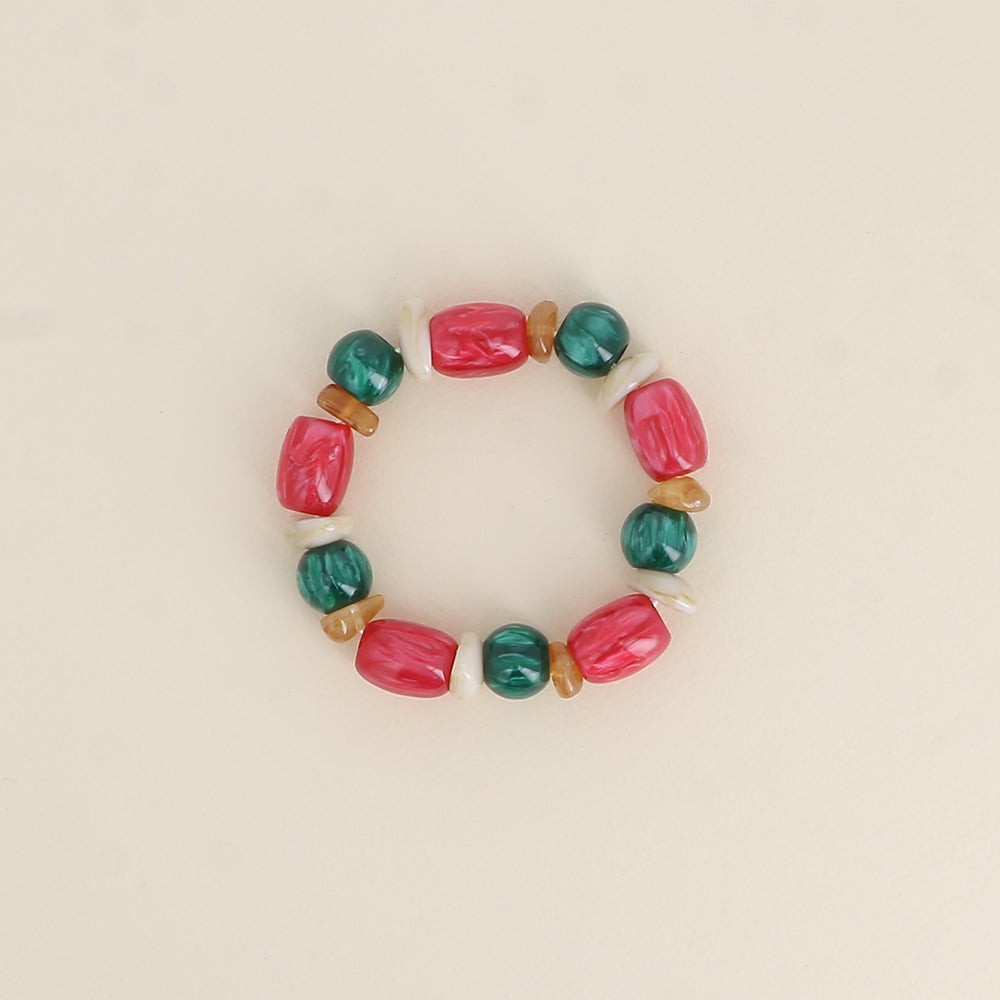 Bracelet élastique - perles en résine fushia