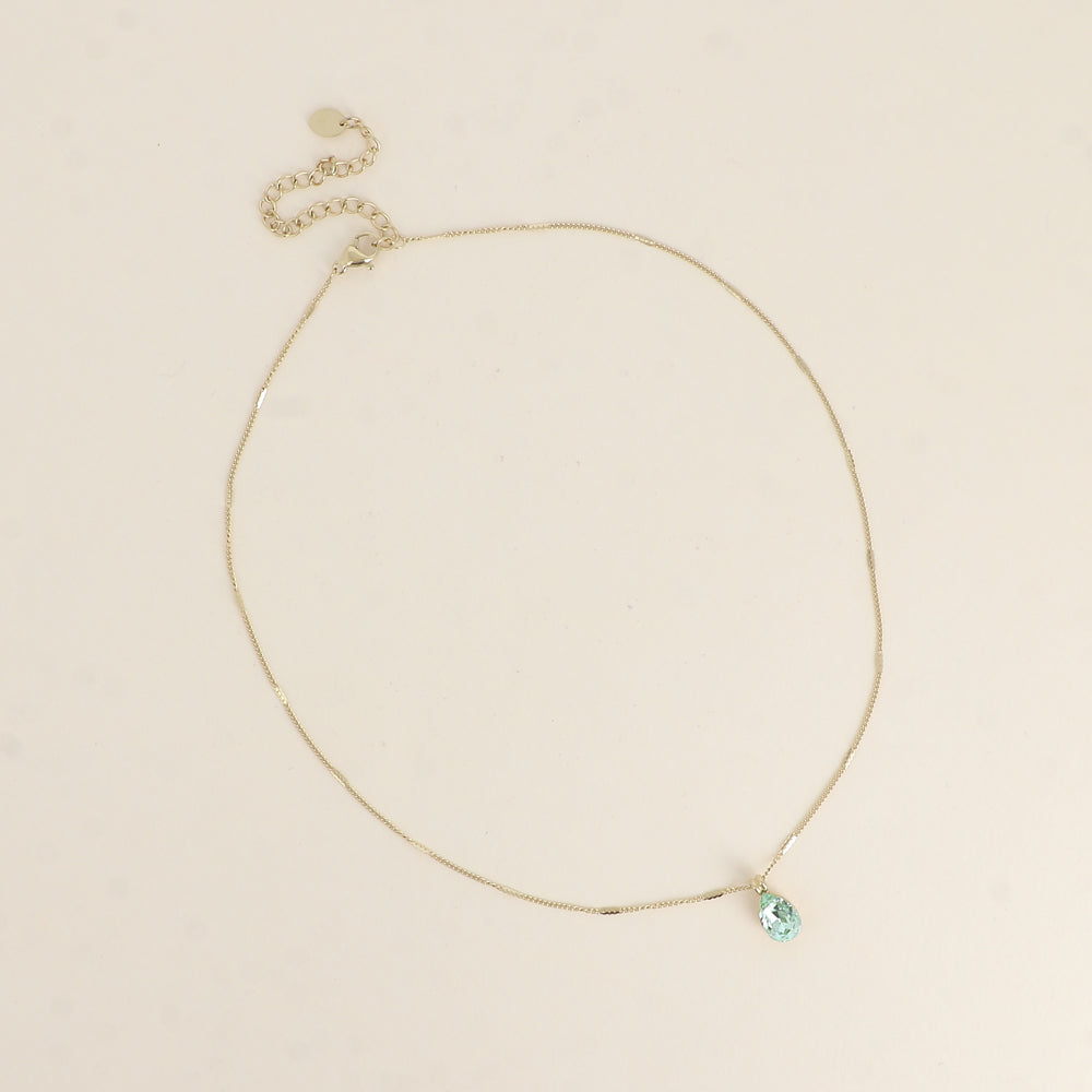 Collier orné de cristaux de Swarovski® en forme de goutte - Longueur de chaîne : 38+7 cm - Dimensions du cristal : 7x10 mm - Chrysolite