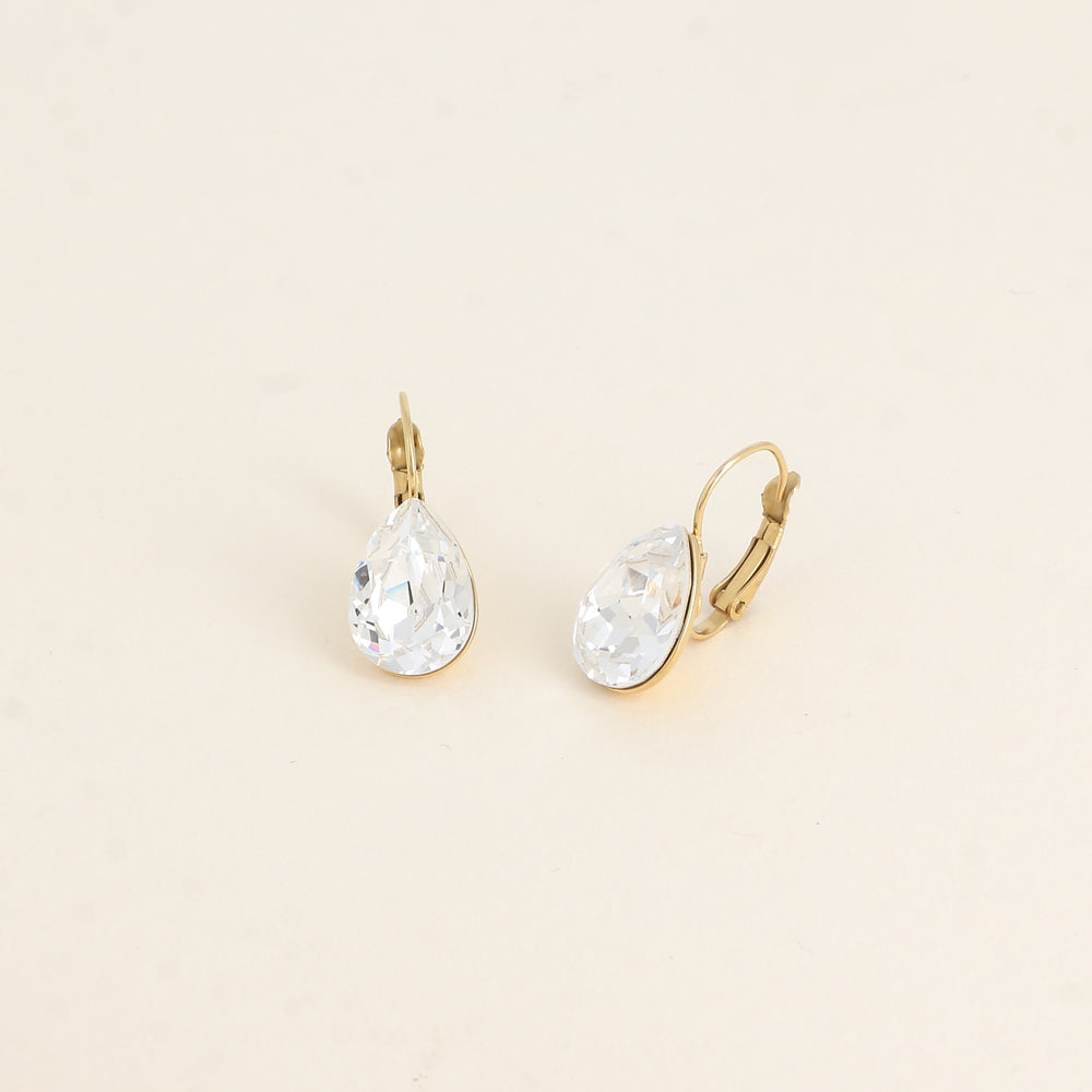 Boucles dormeuses ornées de cristaux de Swarovski® - Dimensions de la boucle : 10 x 23mm - Dimensions du cristal : 10 x 13mm - Chrystal