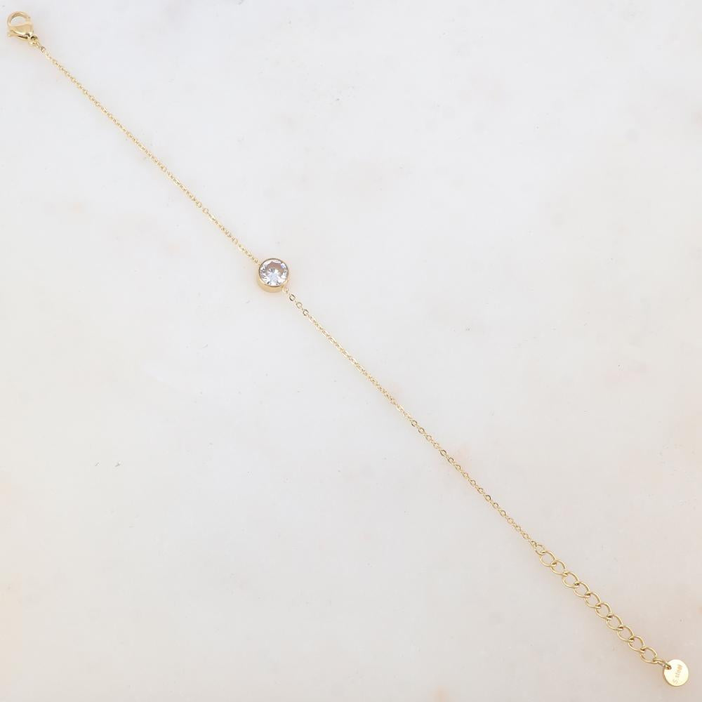 Bracelet avec pièce ronde sertie d'un strass