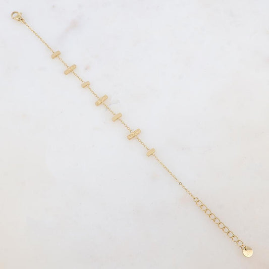 Bracelet avec 7 barres : 3 martelées et 4 lisses