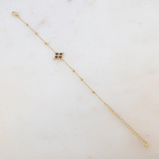 Bracelet avec pièce ornée de 4 strass, petites boules