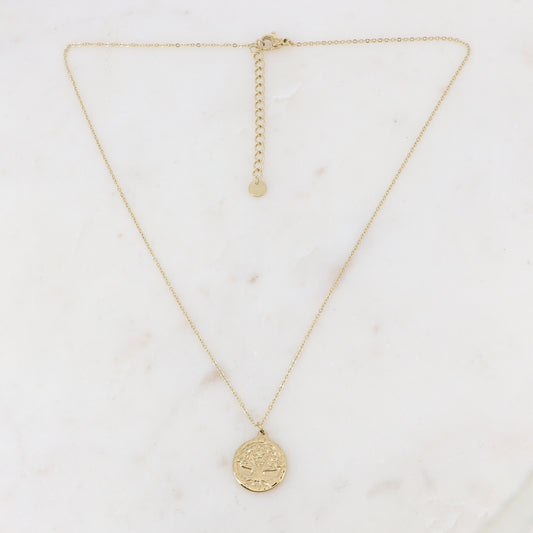 Collier doré composé d'un pendentif rond avec un motif arbre de vie 40+5 cm