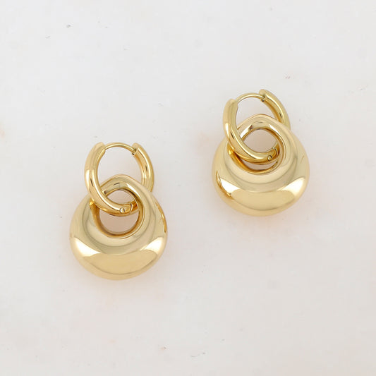 Créoles en forme d'anneau avec un pendant géométrique, effet miroir et lisse 1,8 x 2,6 cm.