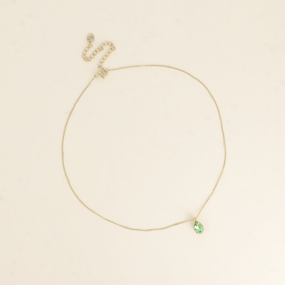 Collier orné de cristaux de Swarovski® en forme de goutte - Longueur de chaîne : 38+7 cm - Dimensions du cristal : 7x10 mm - Peridot